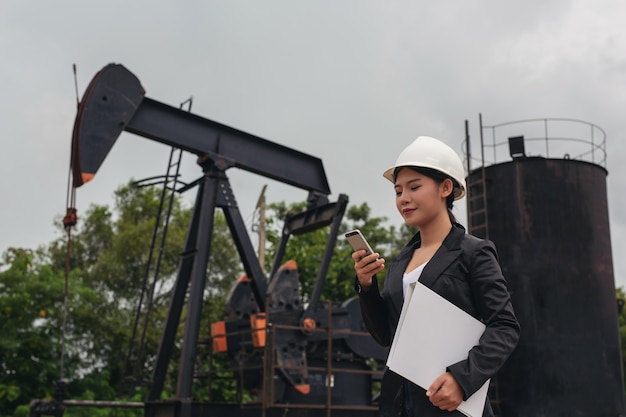 female engineer working at the oilfield