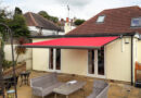 Transform Your Patio with Custom Awnings and Glass Rooms